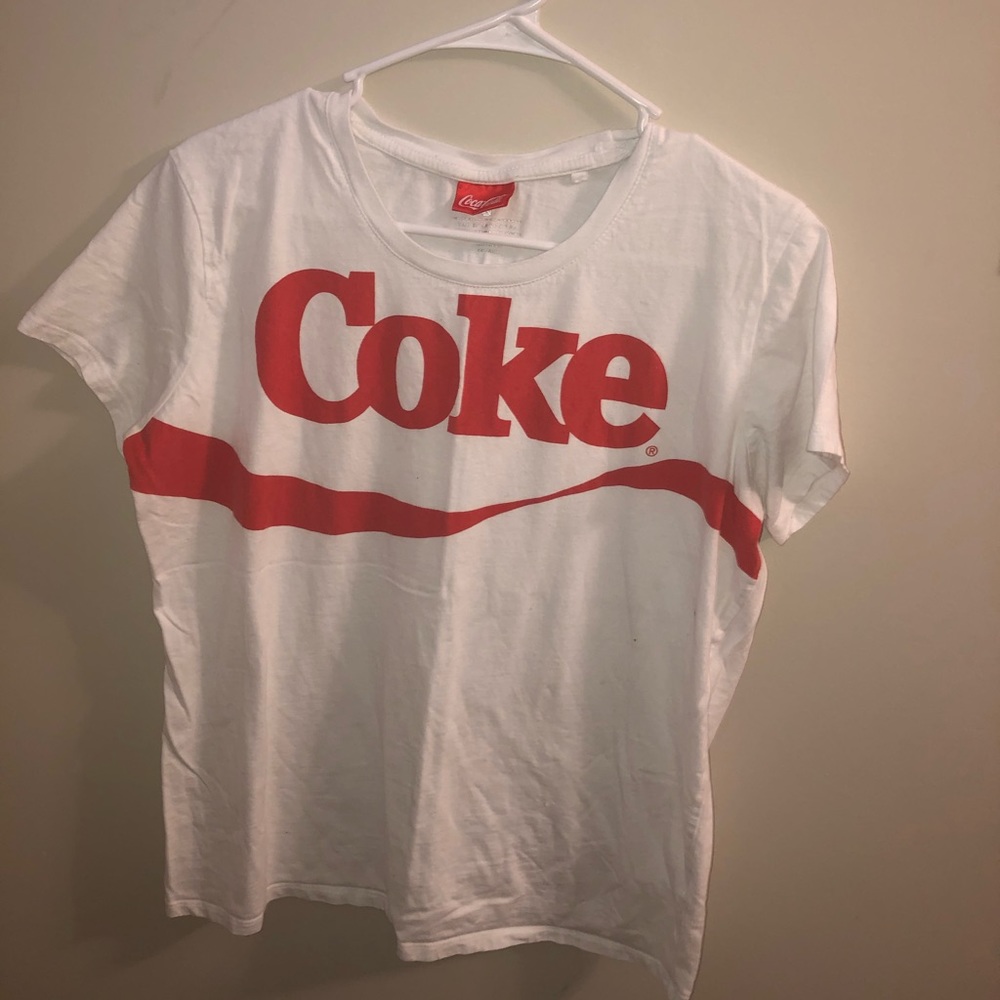 Red and white coke tee shirt.